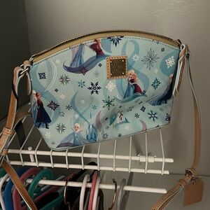 Dooney and Burke crossbody Frozen bag. Never used with tags